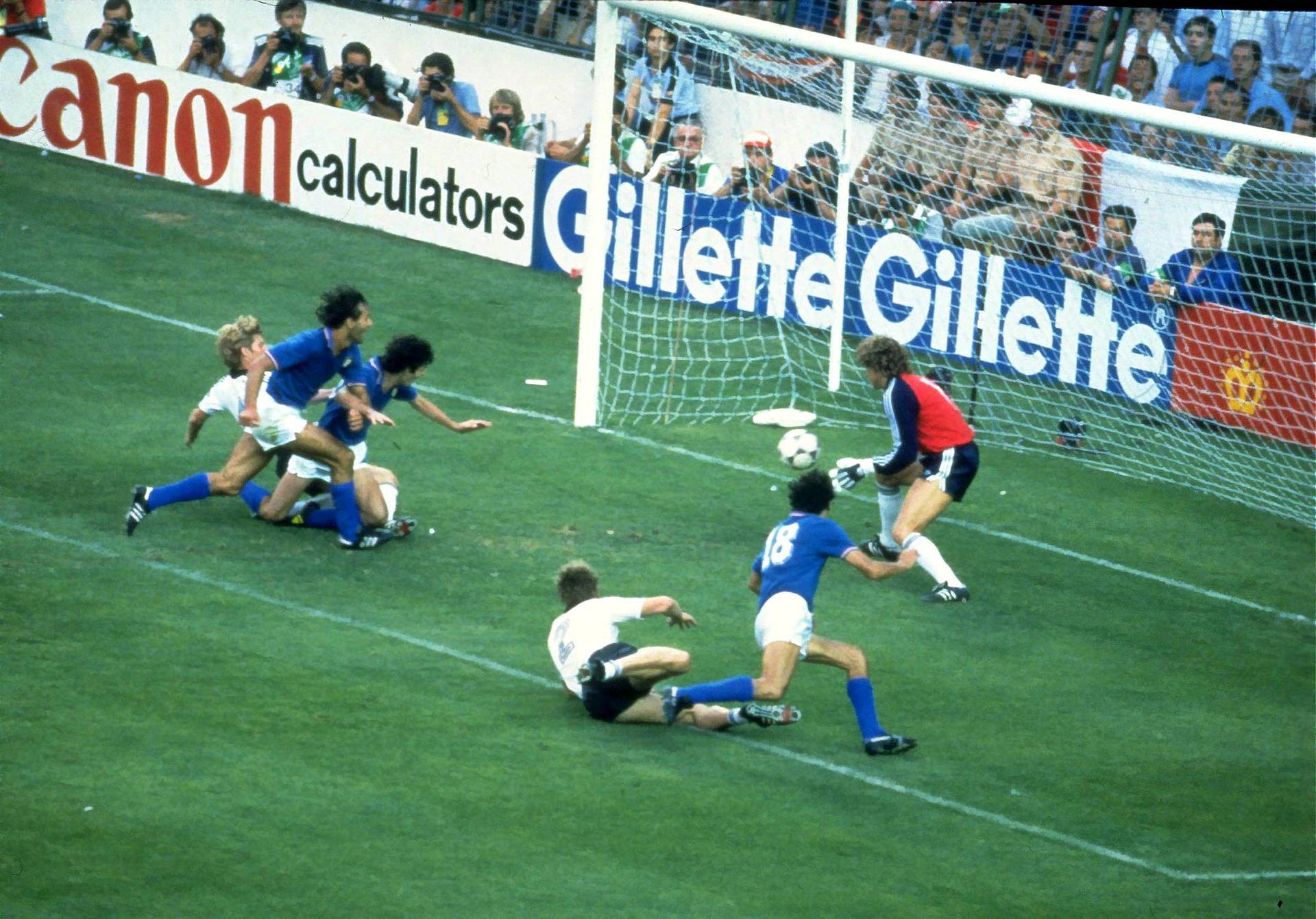 FILE PHOTO: Paolo Rossi scores a goal for Italy