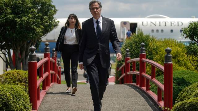 U.S Secretary of State Blinken speaks to the media before boarding his airplane at Yokota Air Base in Fussa