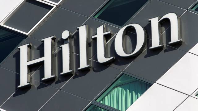 FILE PHOTO: The logo of an Hilton hotel is seen at Schiphol airport near the city of Amsterdam
