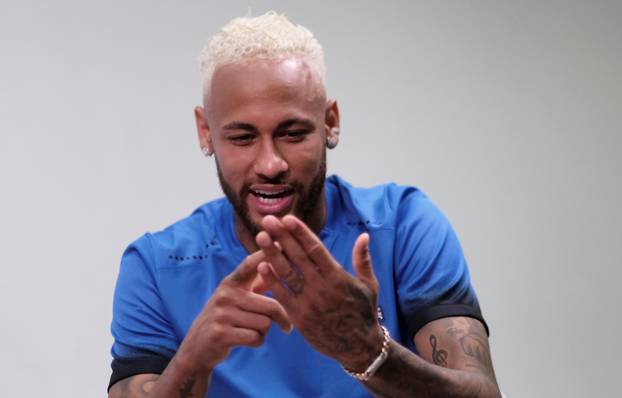 Brazilian soccer player Neymar smiles during an interview with Reuters in Praia Grande