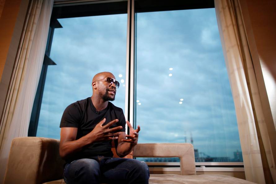 Undefeated boxer Mayweather Jr. of the U.S. speaks during an interview with Reuters in Tokyo