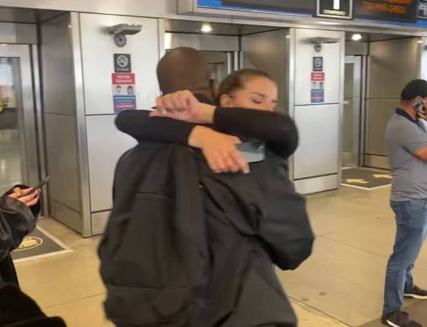 *PREMIUM EXCLUSIVE* Kanye West is all smiles as he reunites with girlfriend Julia Fox at Miami International Airport