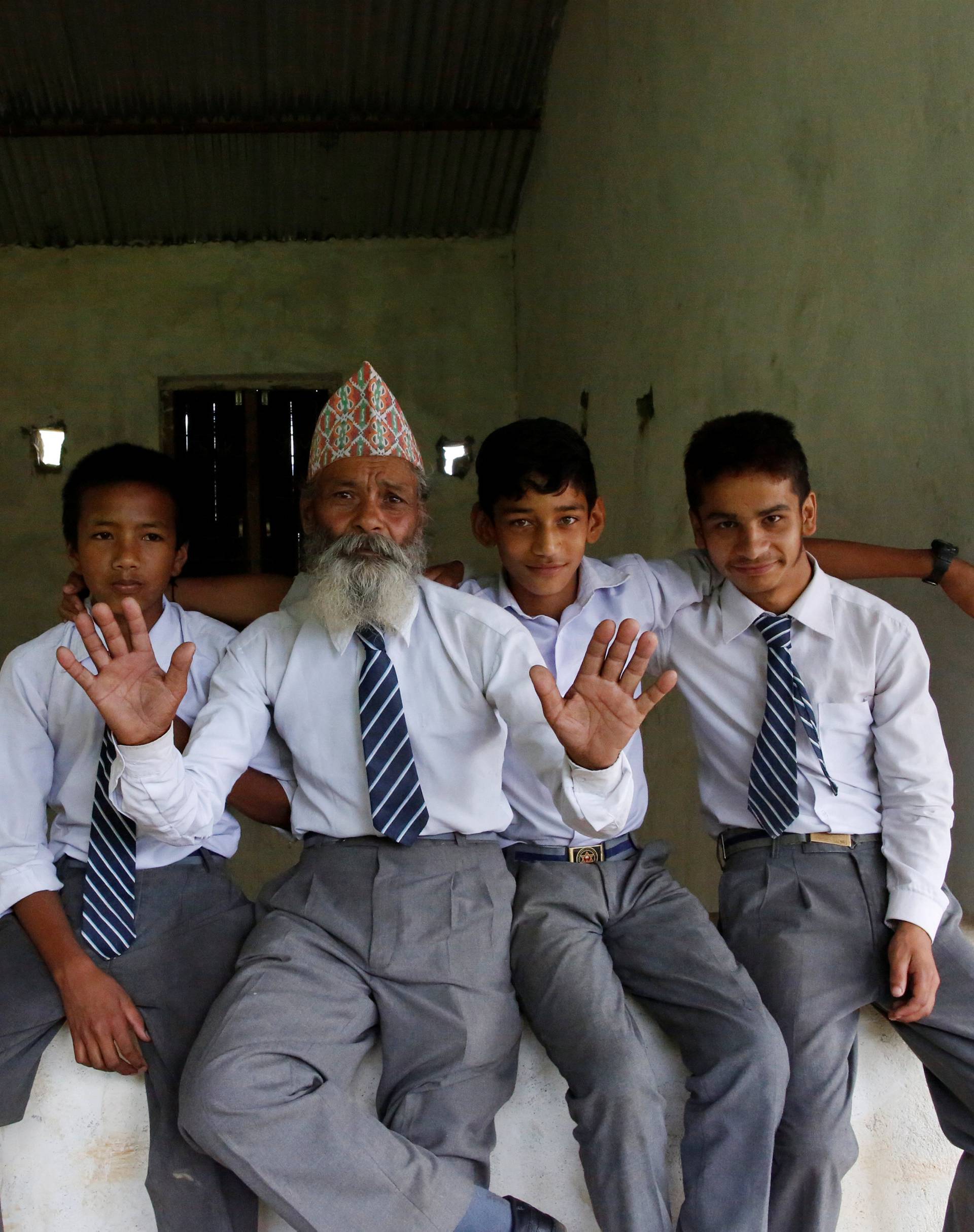 The Wider Image: Nepal's 68-year-old student