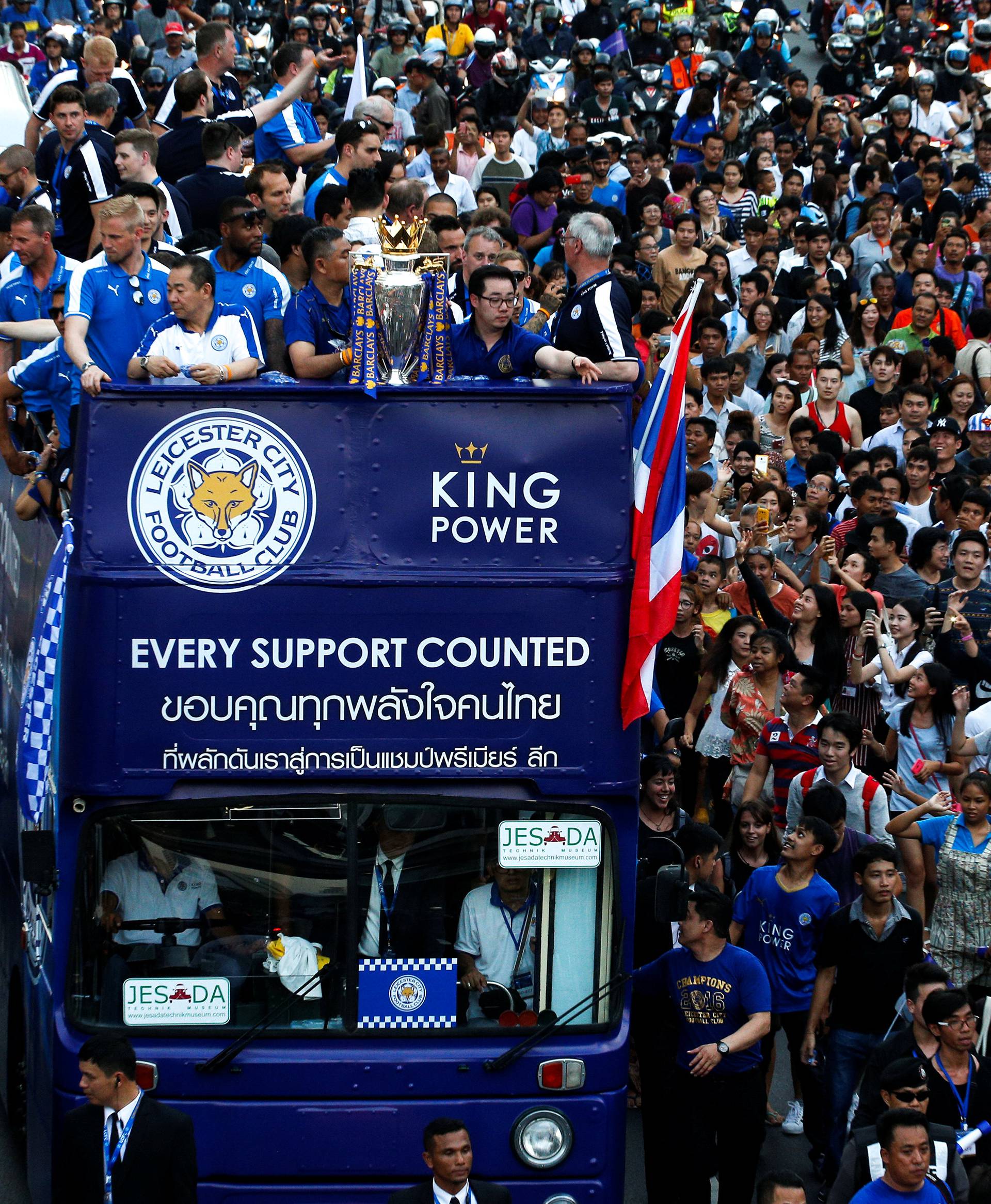 Leicester City soccer club's team members parade to celebrate club's English Premier League title in Bangkok