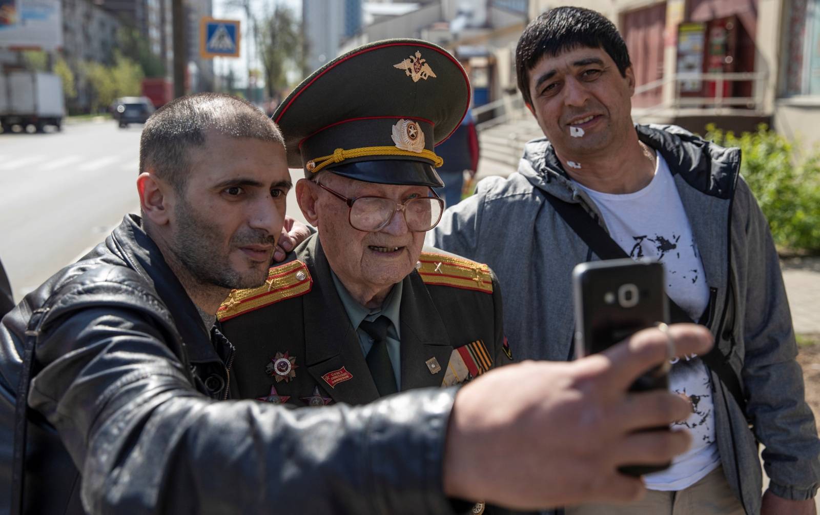The Wider Image: Russian WW2 veteran, 100, calls for peace on Victory Day