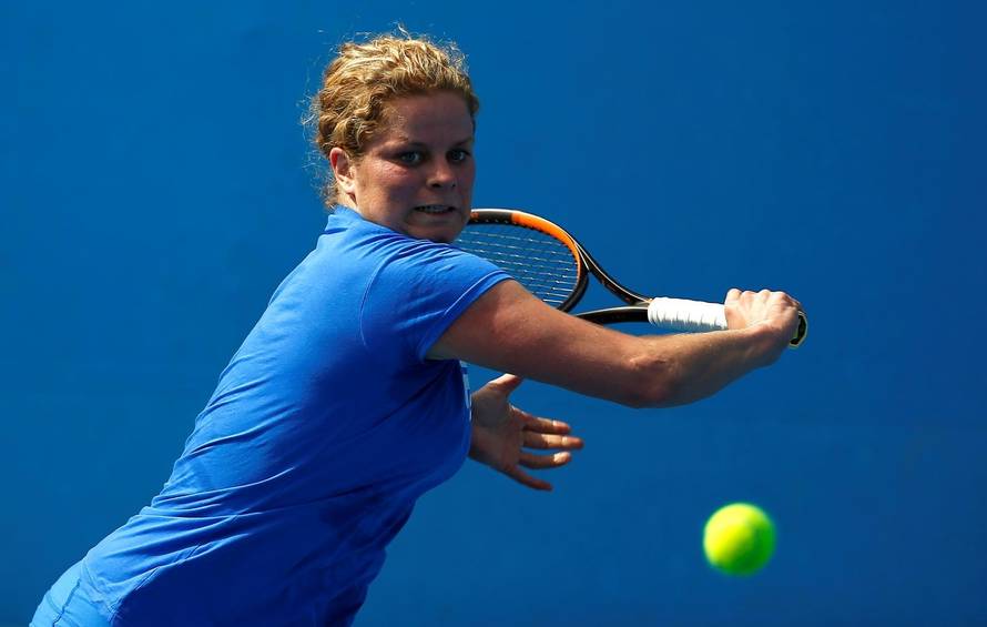FILE PHOTO: Belgium's Kim Clijsters hits a shot during a practice session at Melbourne Park, Australia