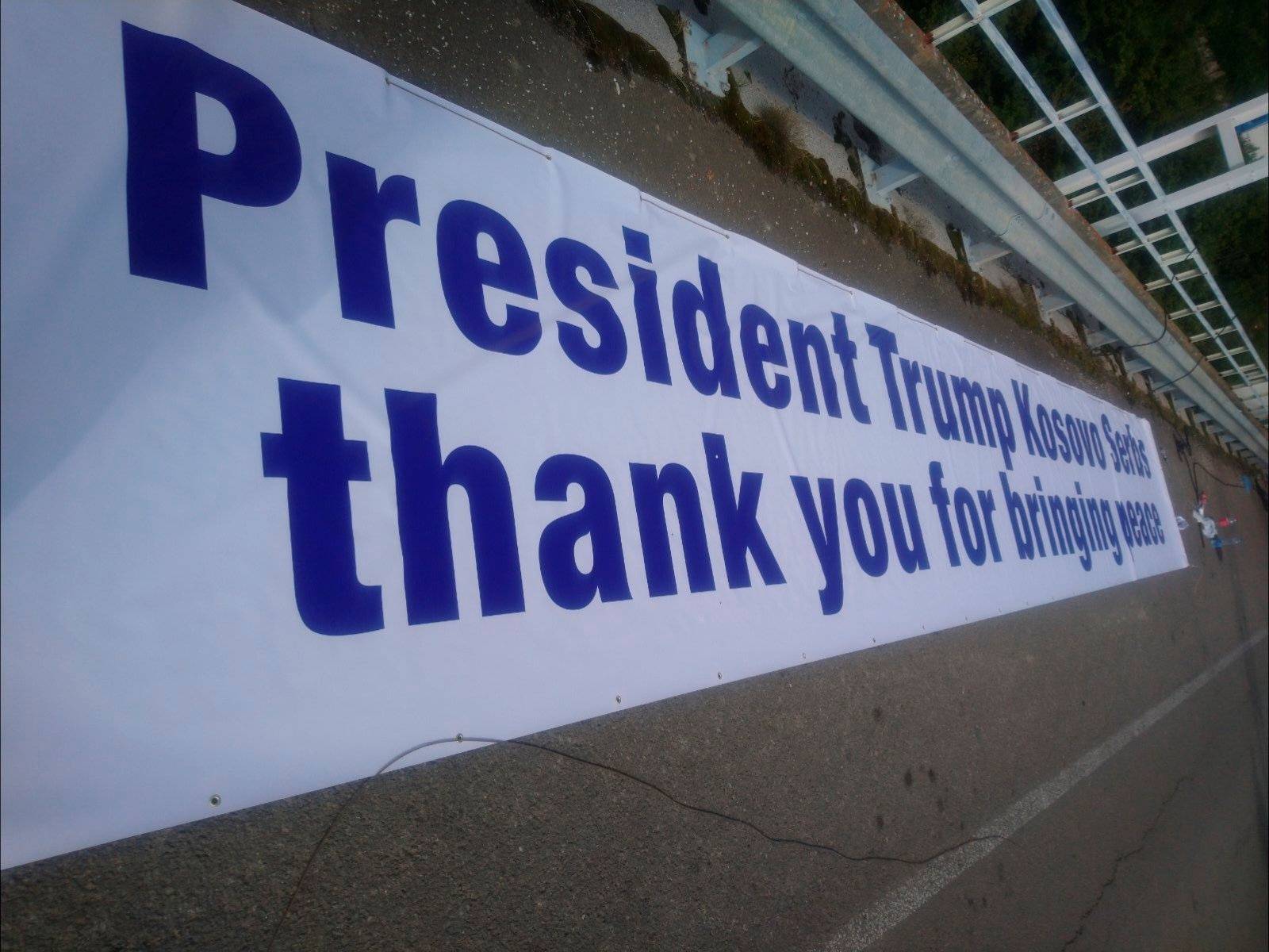 A banner with a message of gratefulness to U.S. President Donald Trump is seen near Gazivoda Lake
