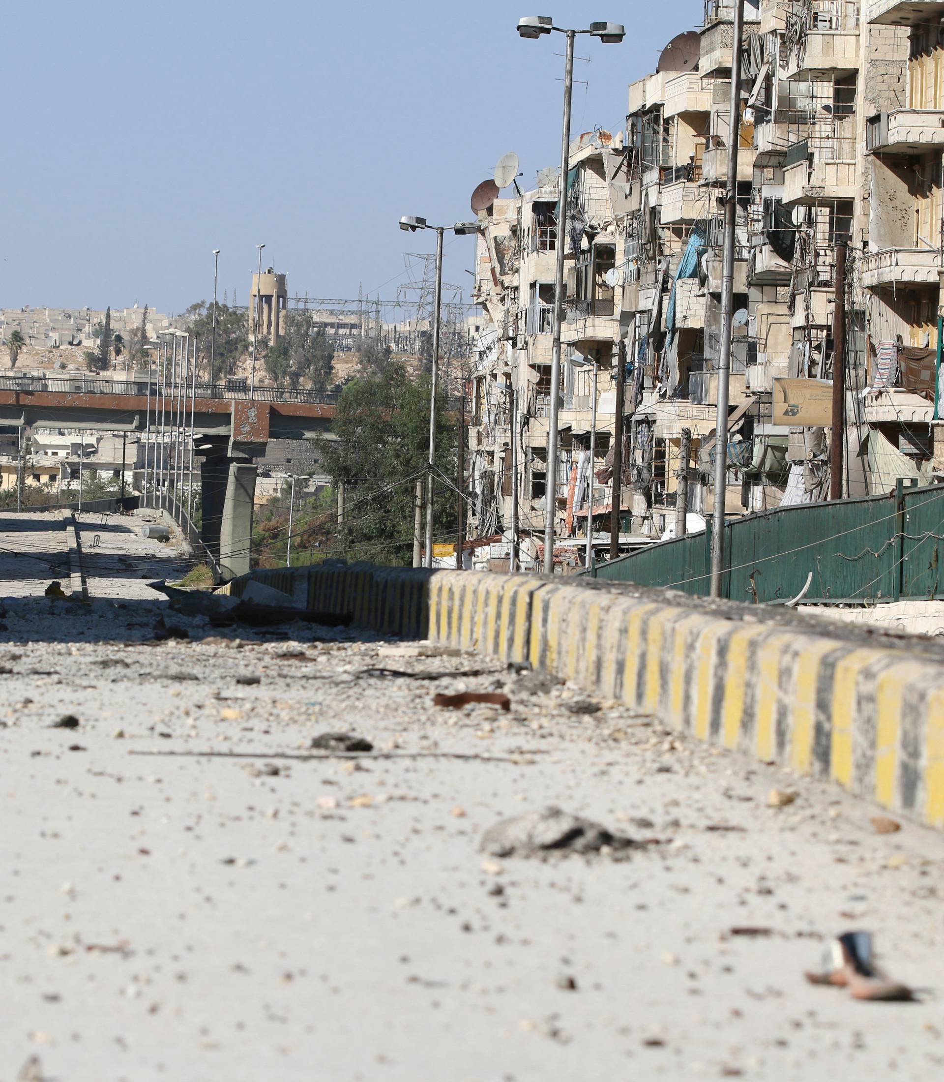 A damaged highway is pictured in the rebel-held al-Shaar neighbourhood of Aleppo