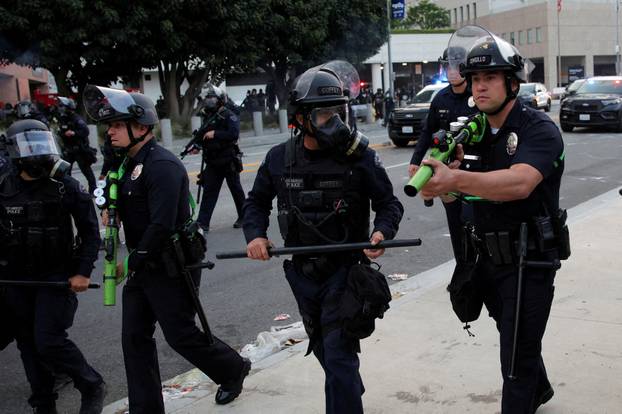 FILE PHOTO: Protesters gather around the Los Angeles Federal Building after multiple detentions by ICE, in Los Angeles