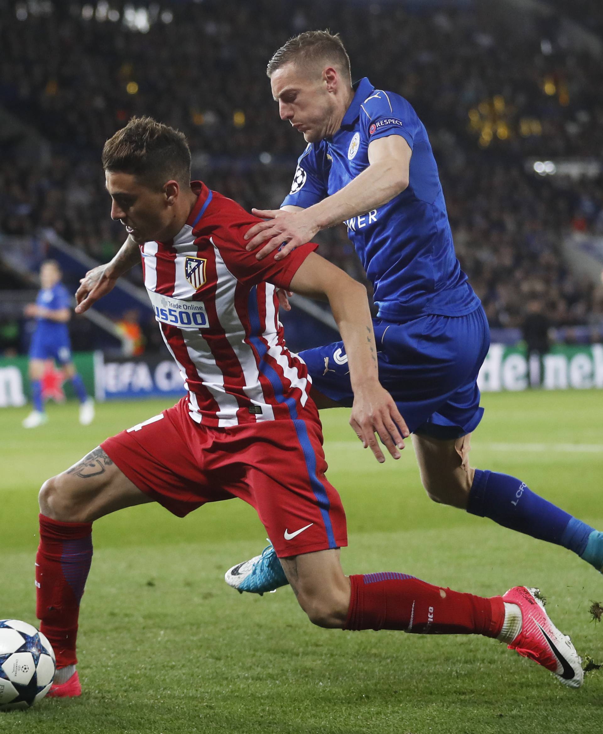 Atletico Madrid's Jose Gimenez in action with Leicester City's Jamie Vardy