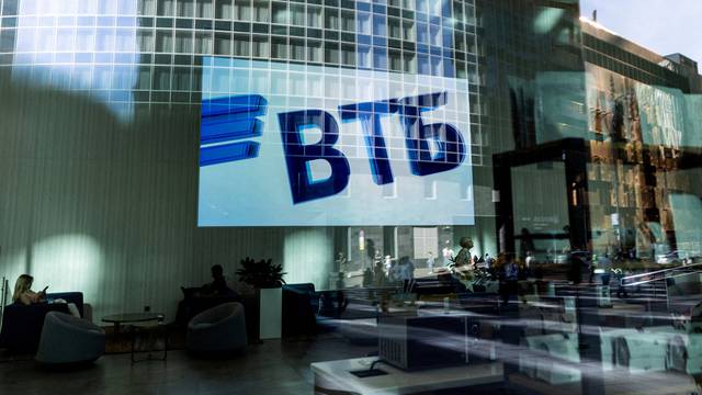 FILE PHOTO: FILE PHOTO: A VTB bank logo is seen on screen through a window in the Moscow International Business Centeron a sunny day in Moscow