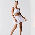 Svijet mode inspirira se retro teniskim krojevima, bijelom bojom i plisiranim suknjama