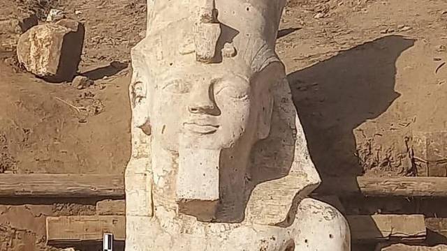 A section of a limestone statue of Ramses II unearthed by an Egyptian-U.S. archaeological mission in El Ashmunein