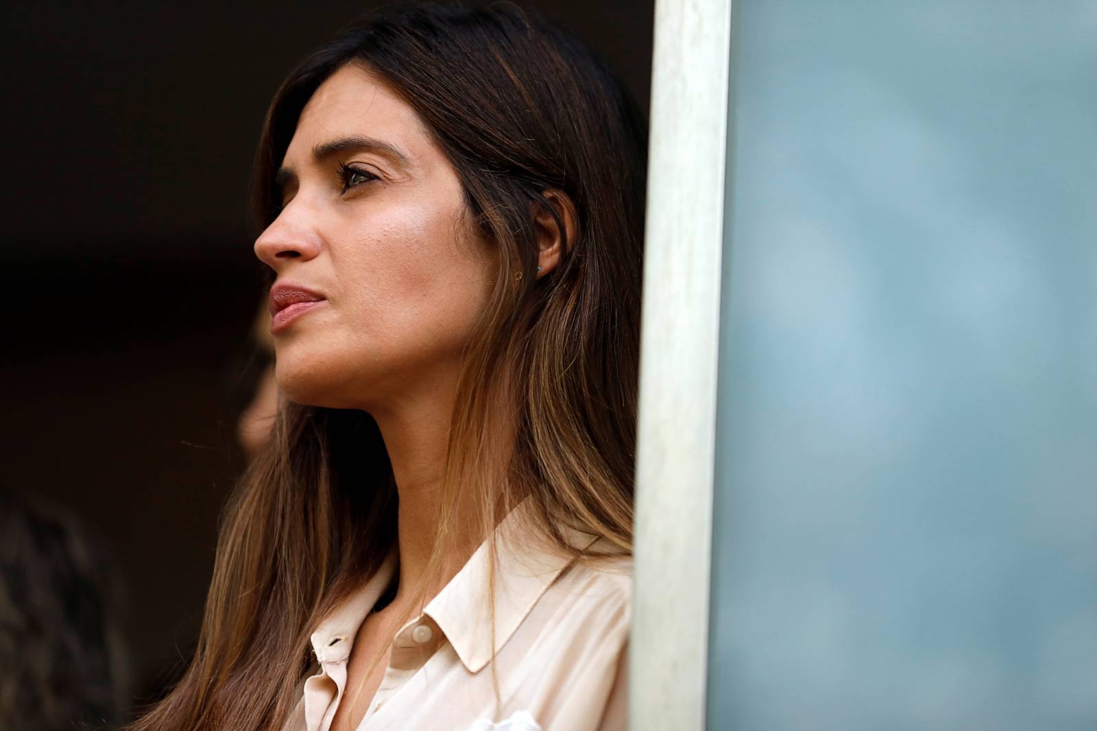 Sara Carbonero, wife of Spanish soccer player Iker Casillas, listens to her husband before they leave CUF Porto hospital in Porto