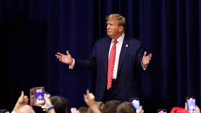 FILE PHOTO: Former U.S. President Trump hosts a campaign rally, in Rome, Georgia