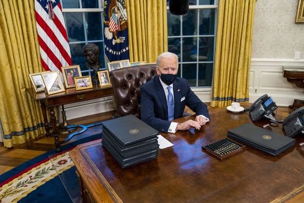 Biden Signs First Executive Orders, Washington, District of Columbia, USA - 20 Jan 2021