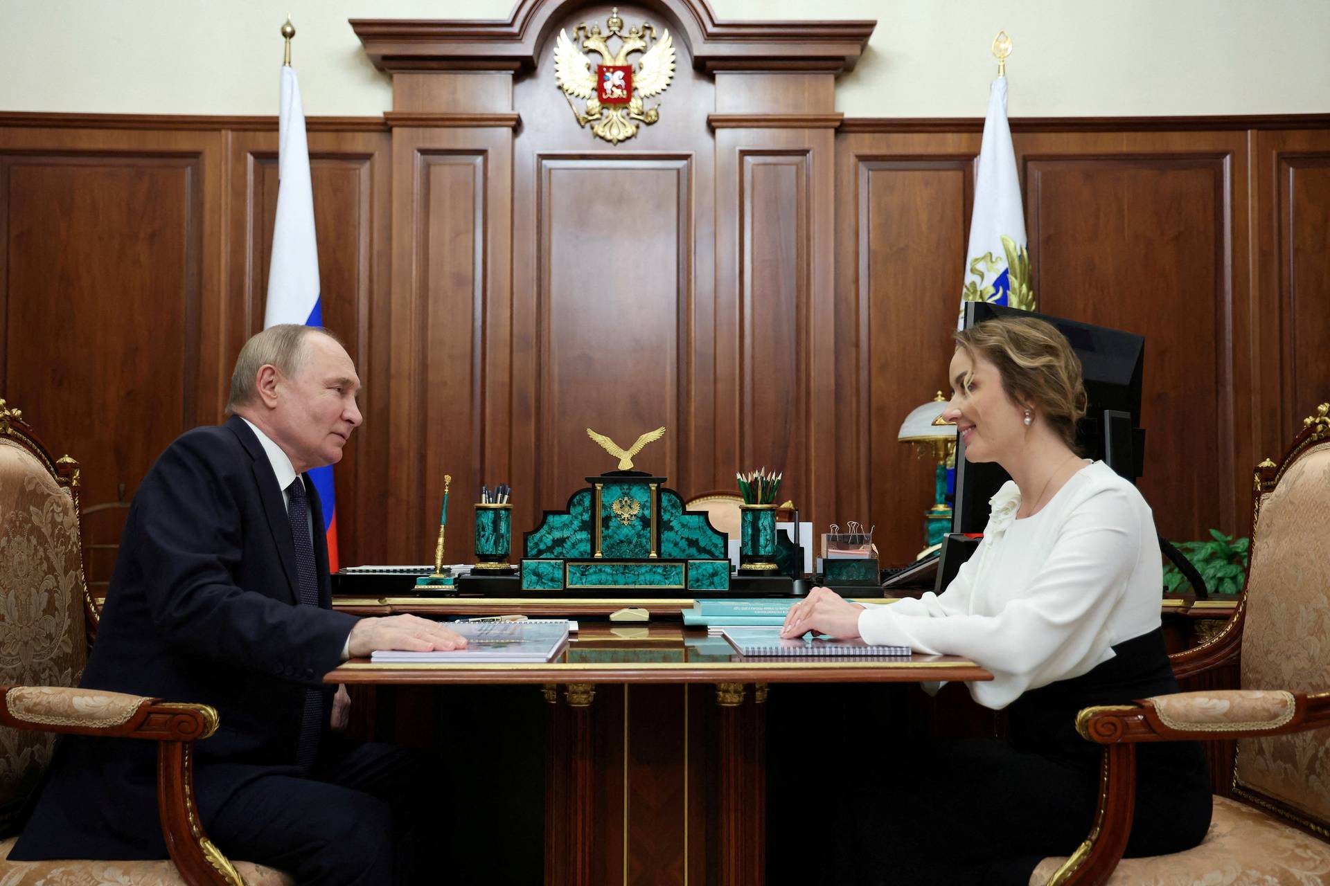 FILE PHOTO: Russian President Putin meets with Presidential Commissioner for Children's Rights Lvova-Belova in Moscow