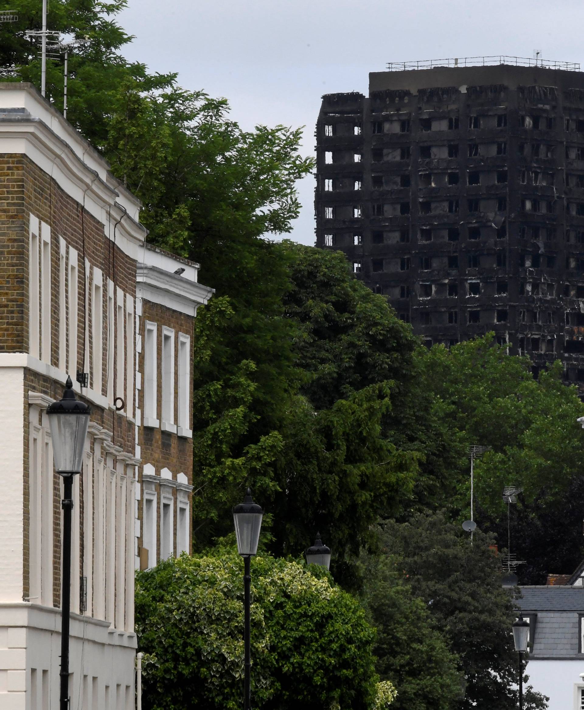 A view of Grenfell Tower from the wealthy area of Holland park in London