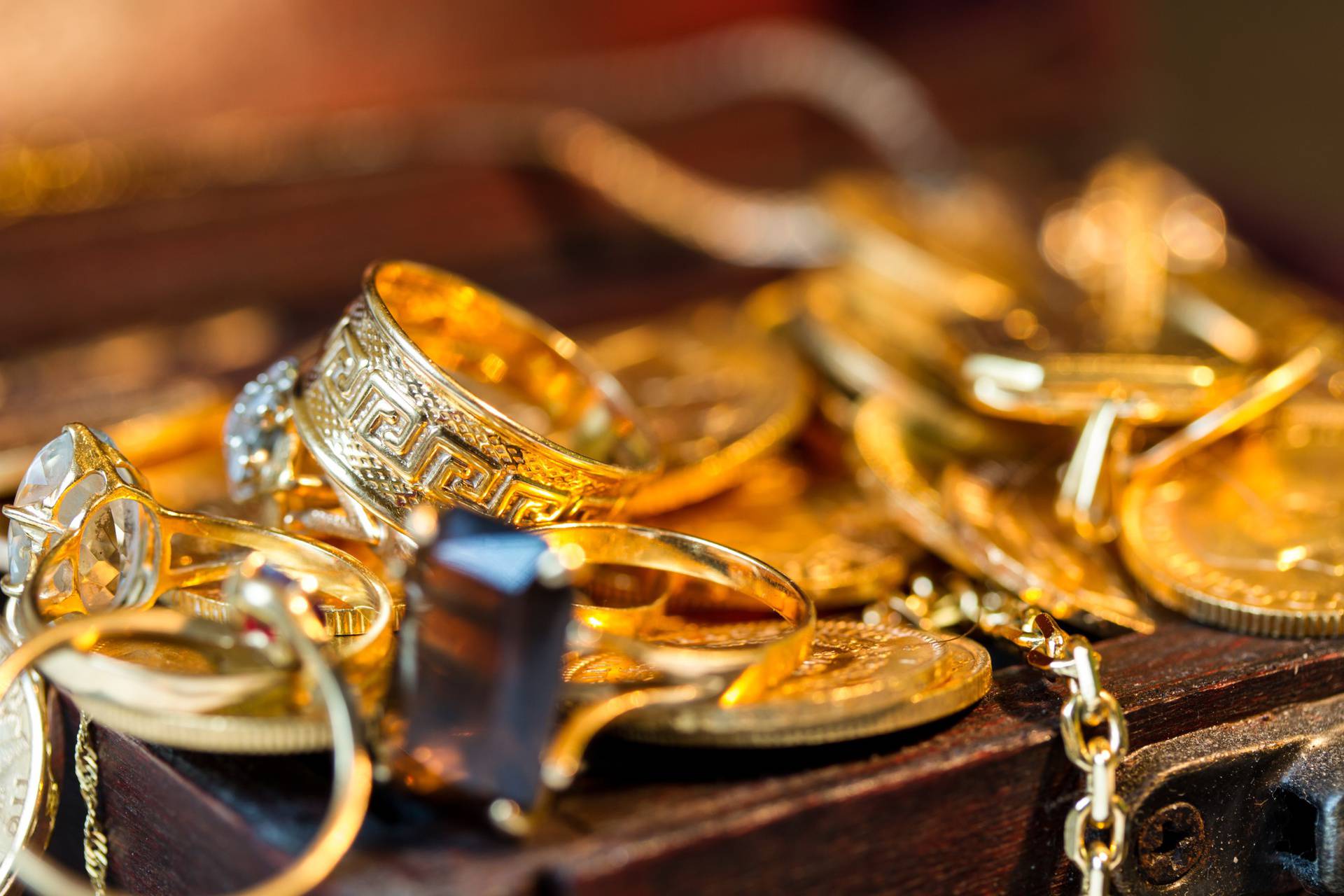 Jewels,And,Gold,Coins,Over,Dark,Background