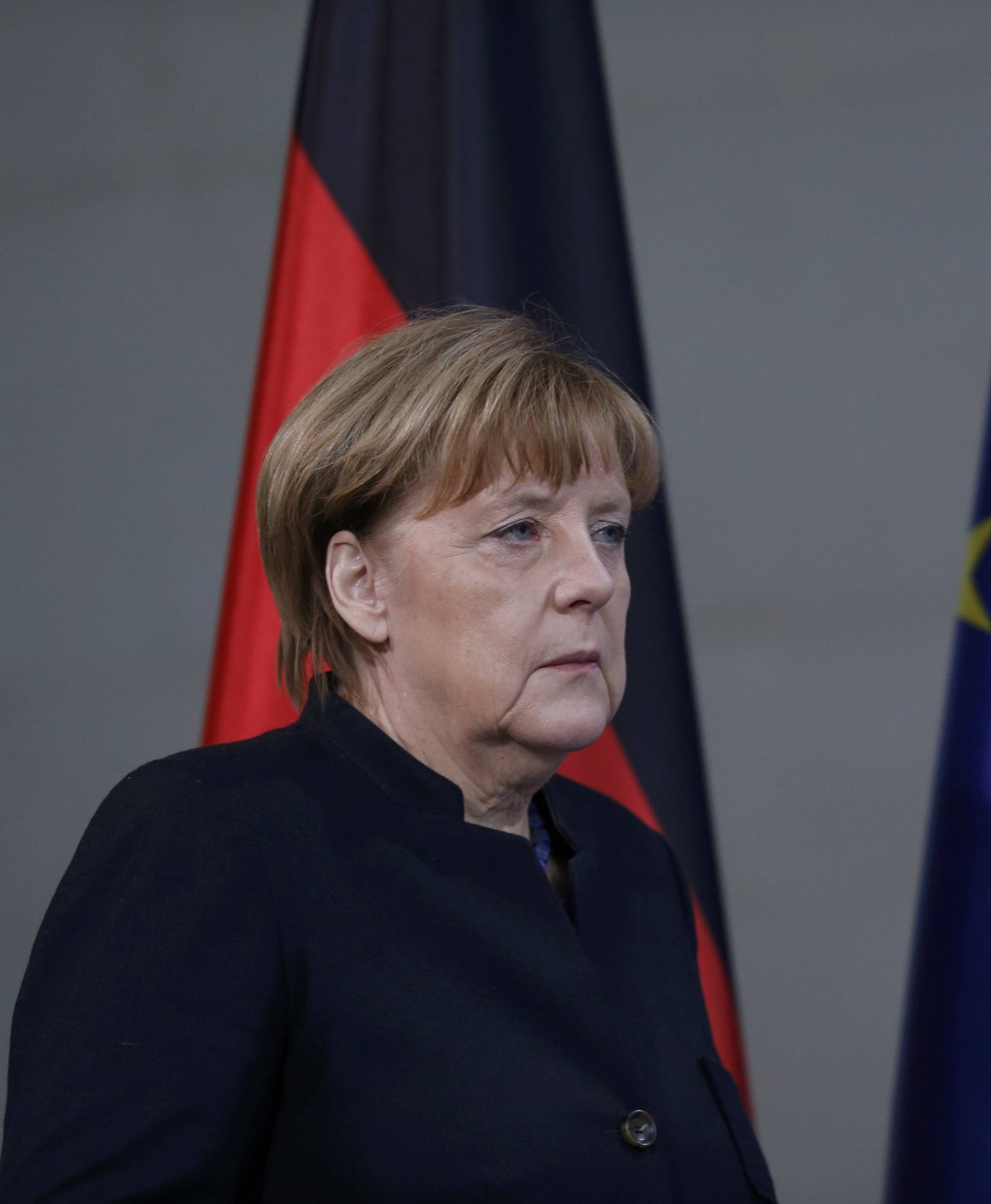 German Chancellor Angela Merkel arrives for a news conference in Berlin