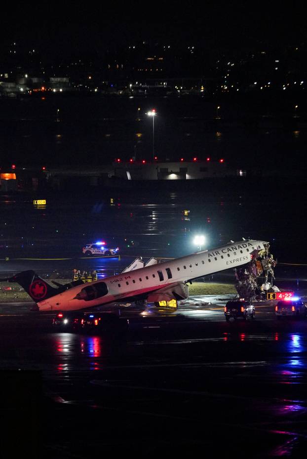 Air Canada Express jet collides with a ground vehicle at LaGuardia airport