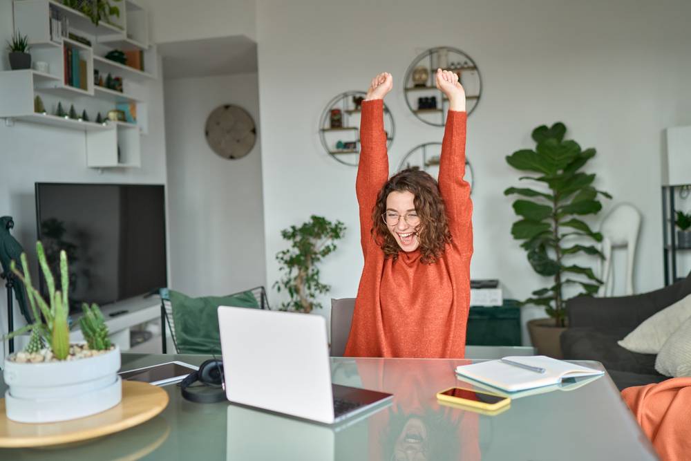 Young,Excited,Happy,Woman,Student,Winner,Success,Using,Computer,Laptop