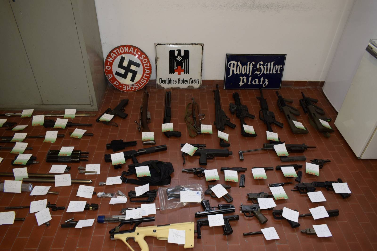 Italian Police handout shows weapons seized in raids on neo-Nazi sympathisers, in Turin