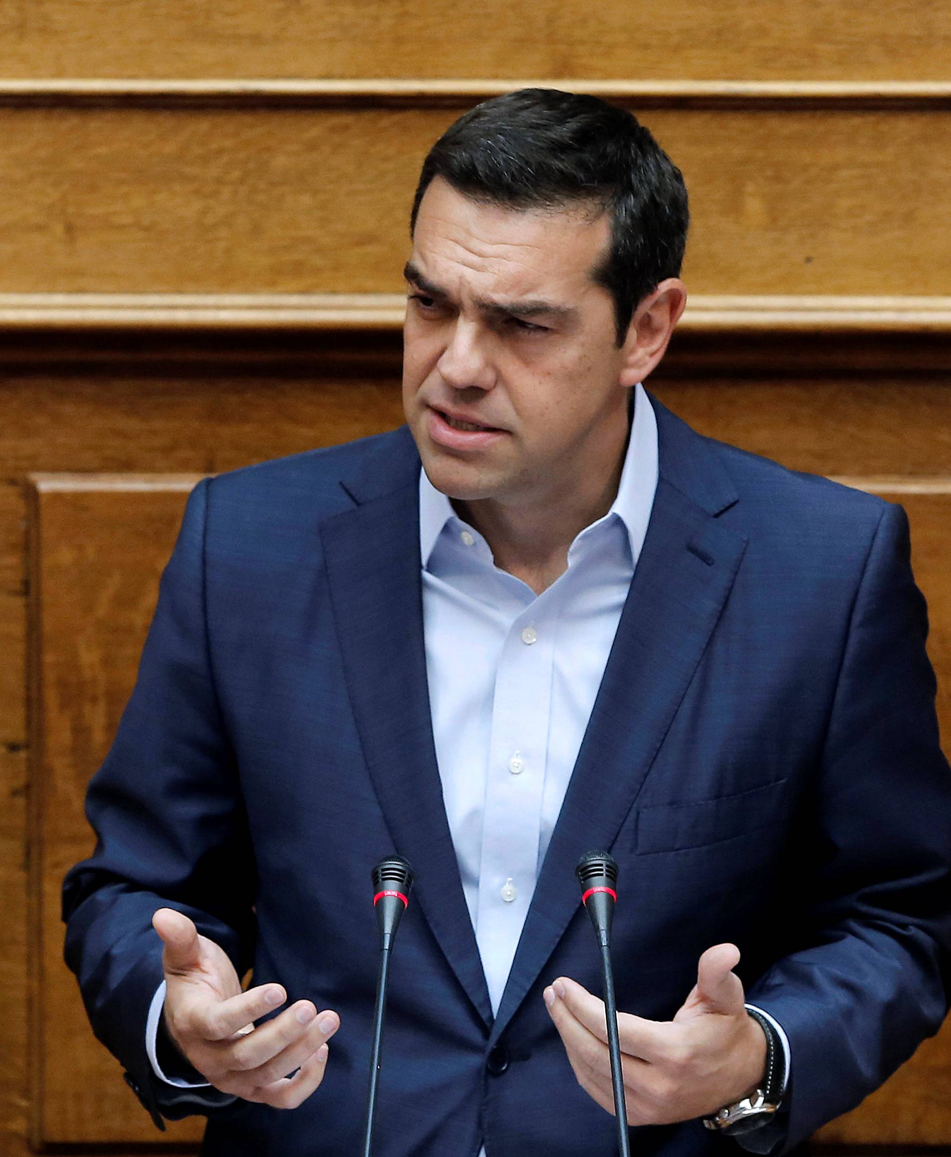 Greek Prime Minister Alexis Tsipras delivers a speech during a parliamentary session on the collapse of Cyprus peace talks in Athens