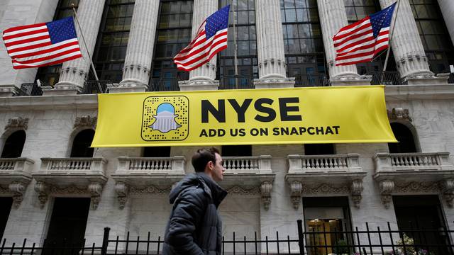 FILE PHOTO: A Snapchat sign hangs on the facade of the NYSE in New York City