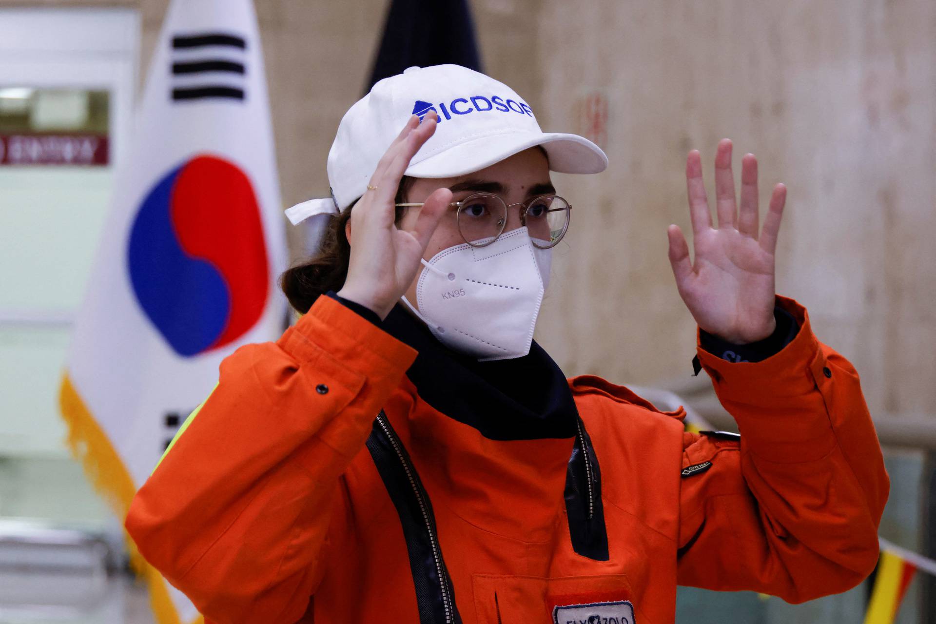 Belgian-British pilot Zara Rutherford, 19, leaves the arrival hall and greets people after landing at Gimpo International airport in Seoul