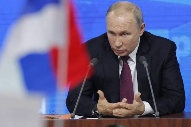 Russian President Putin speaks during annual news conference in Moscow