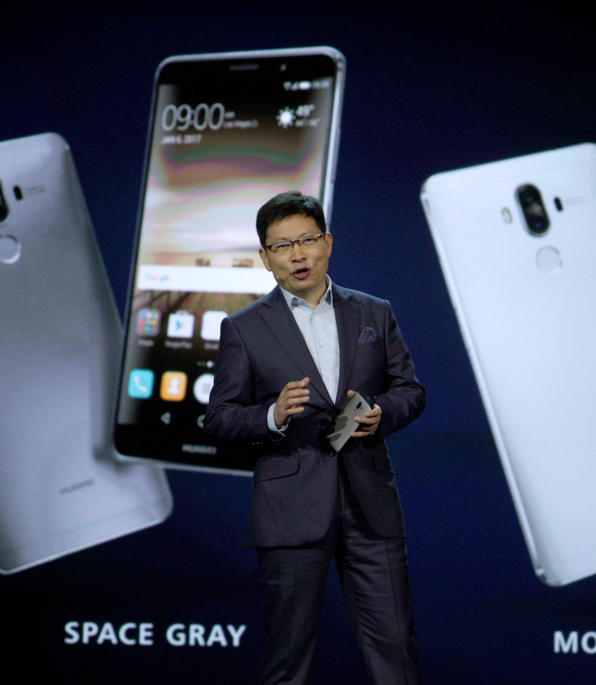 Richard Yu, Huawei CEO Consumer Business Group, talks about their Huawei Mate 9 smartphone just released to the U.S. market and displayed behind him during his keynote address at CES in Las Vegas