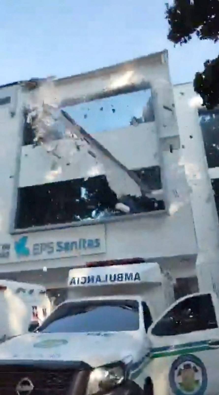 A part of an emergency services building facade falls down during an earthquake in Cali