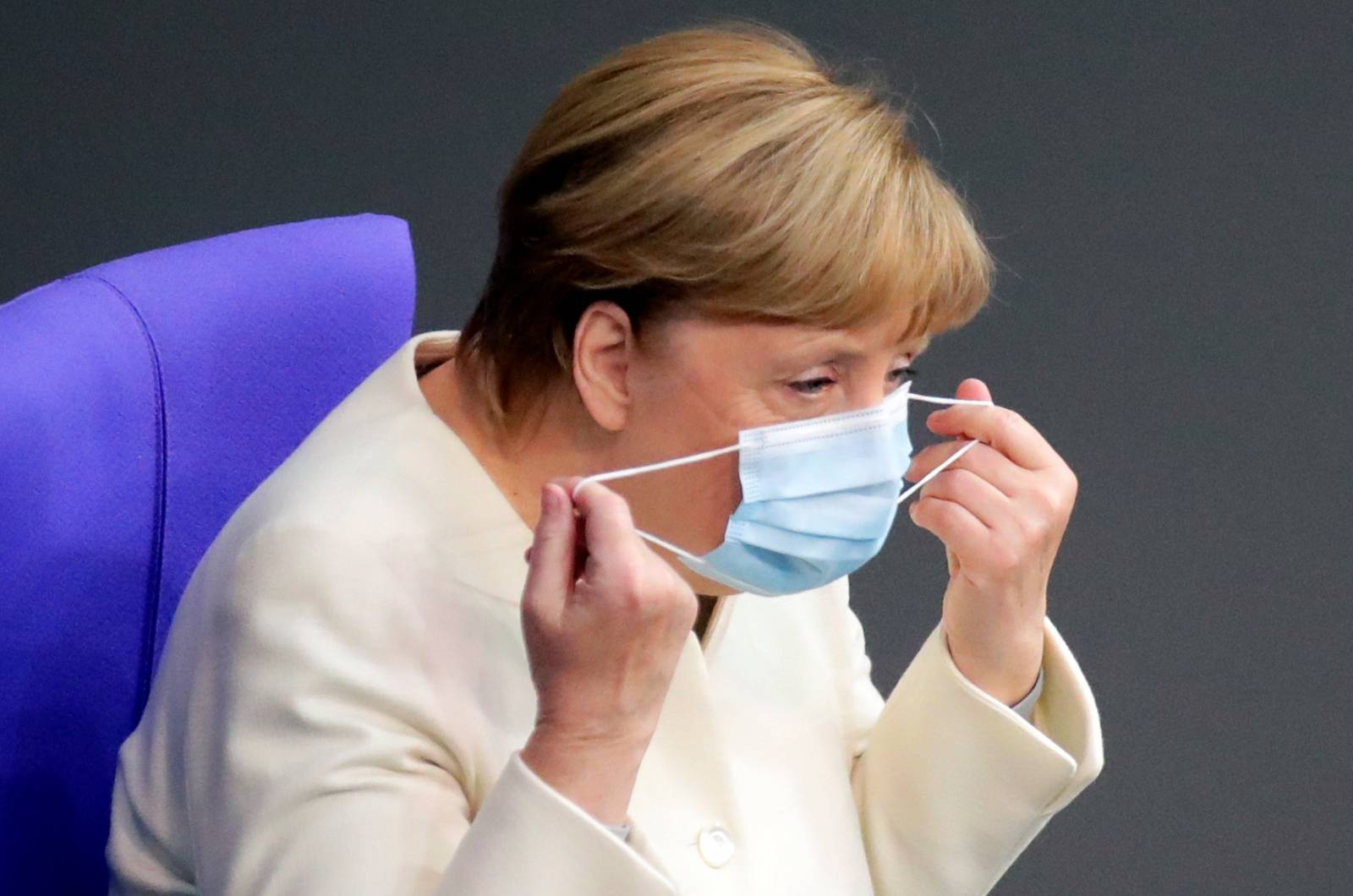 German Chancellor Angela Merkel attends a session of the Bundestag, in Berlin