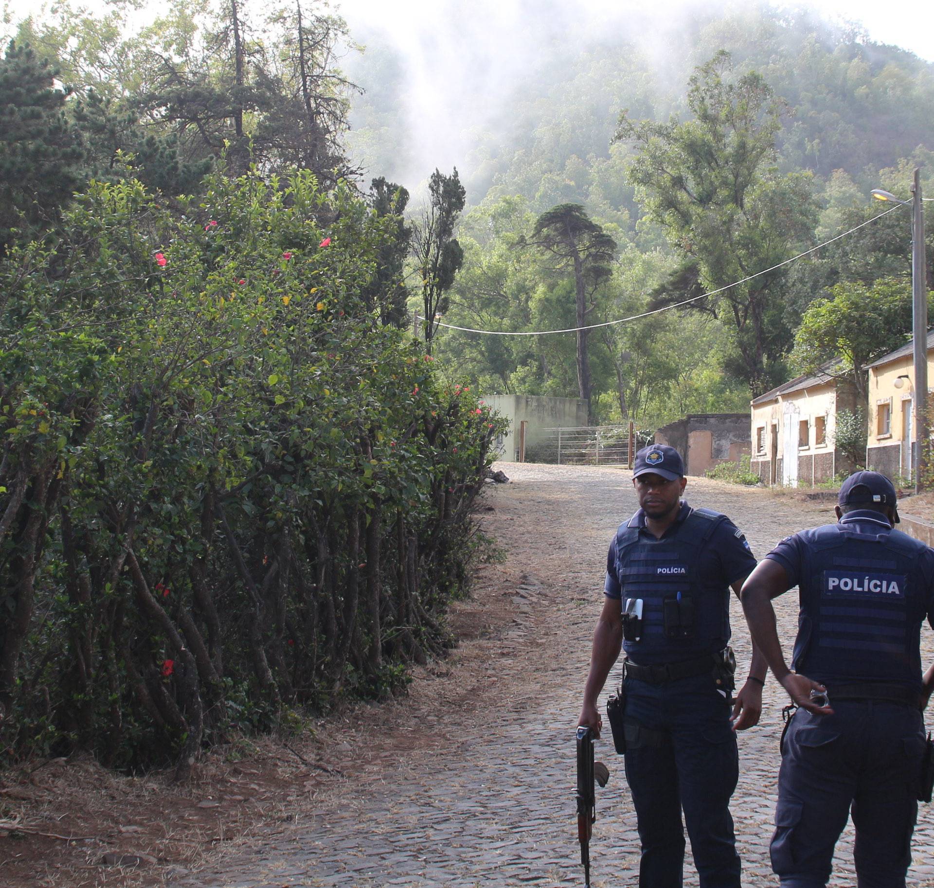 Police stand guard on the road leading to the Spanish embassy in Praia