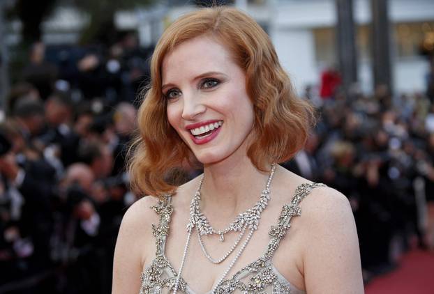 Actress Jessica Chastain poses on the red carpet as she arrives for the screening of the film "Money Monster" out of competition during the 69th Cannes Film Festival in Cannes