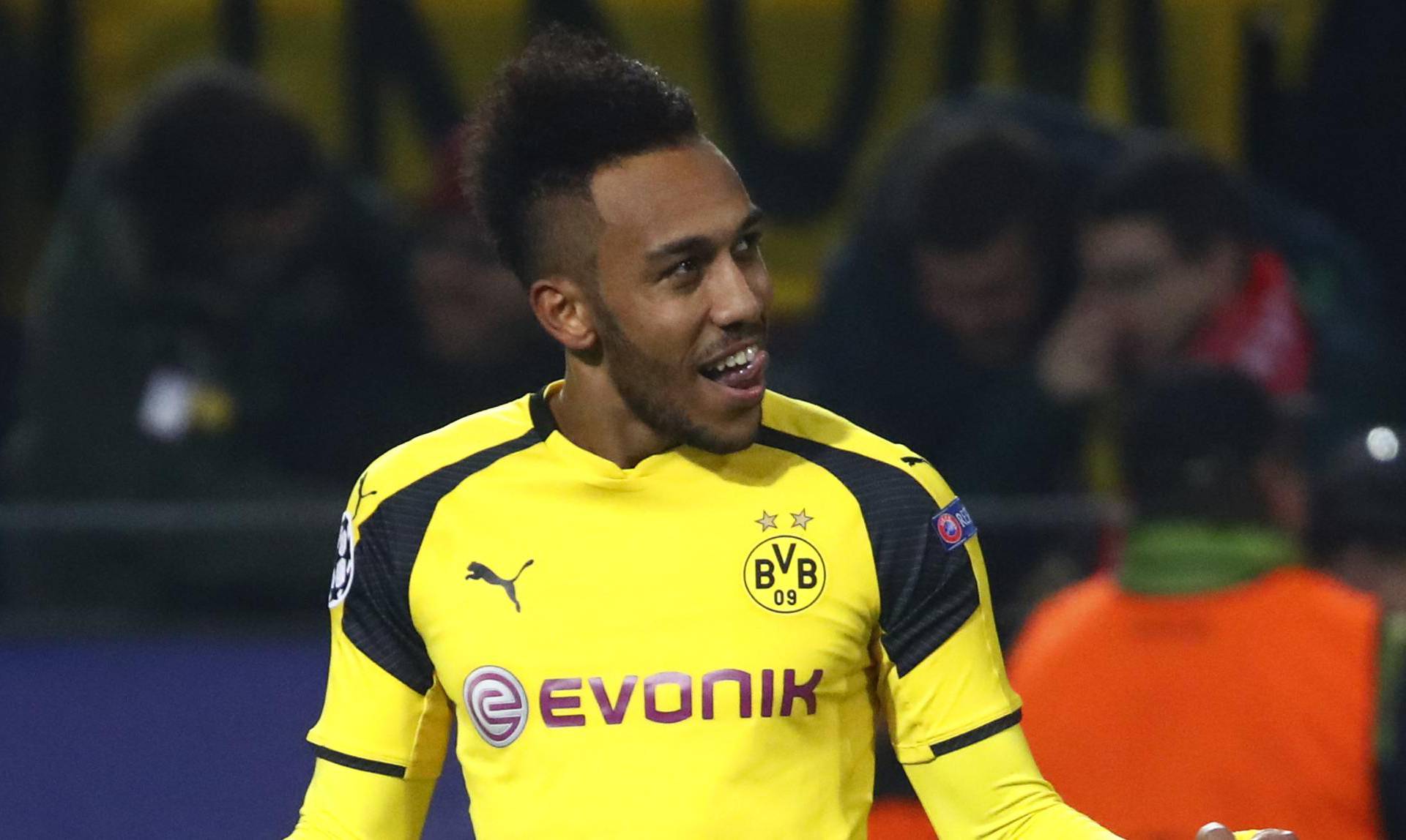 Borussia Dortmund's Pierre-Emerick Aubameyang celebrates scoring their fourth goal and completing his hat trick