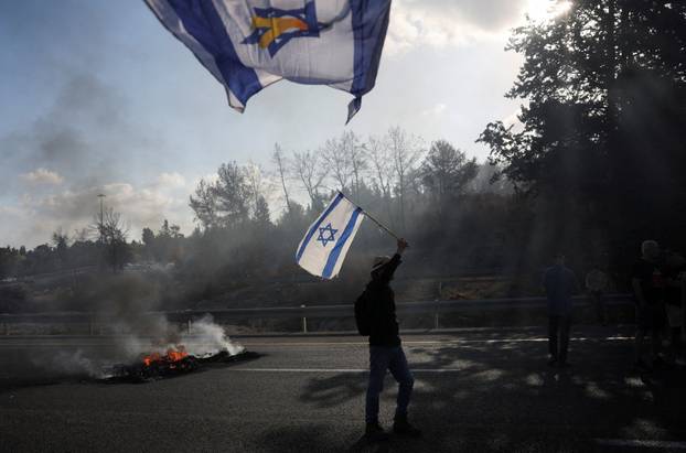 People block Israel's main highway connecting Jerusalem and Tel Aviv near Latrun