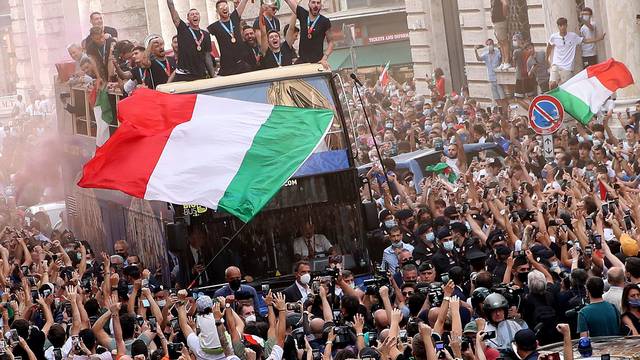 The Italy team drive through Rome on a open top bus tour after they won Euro 2020