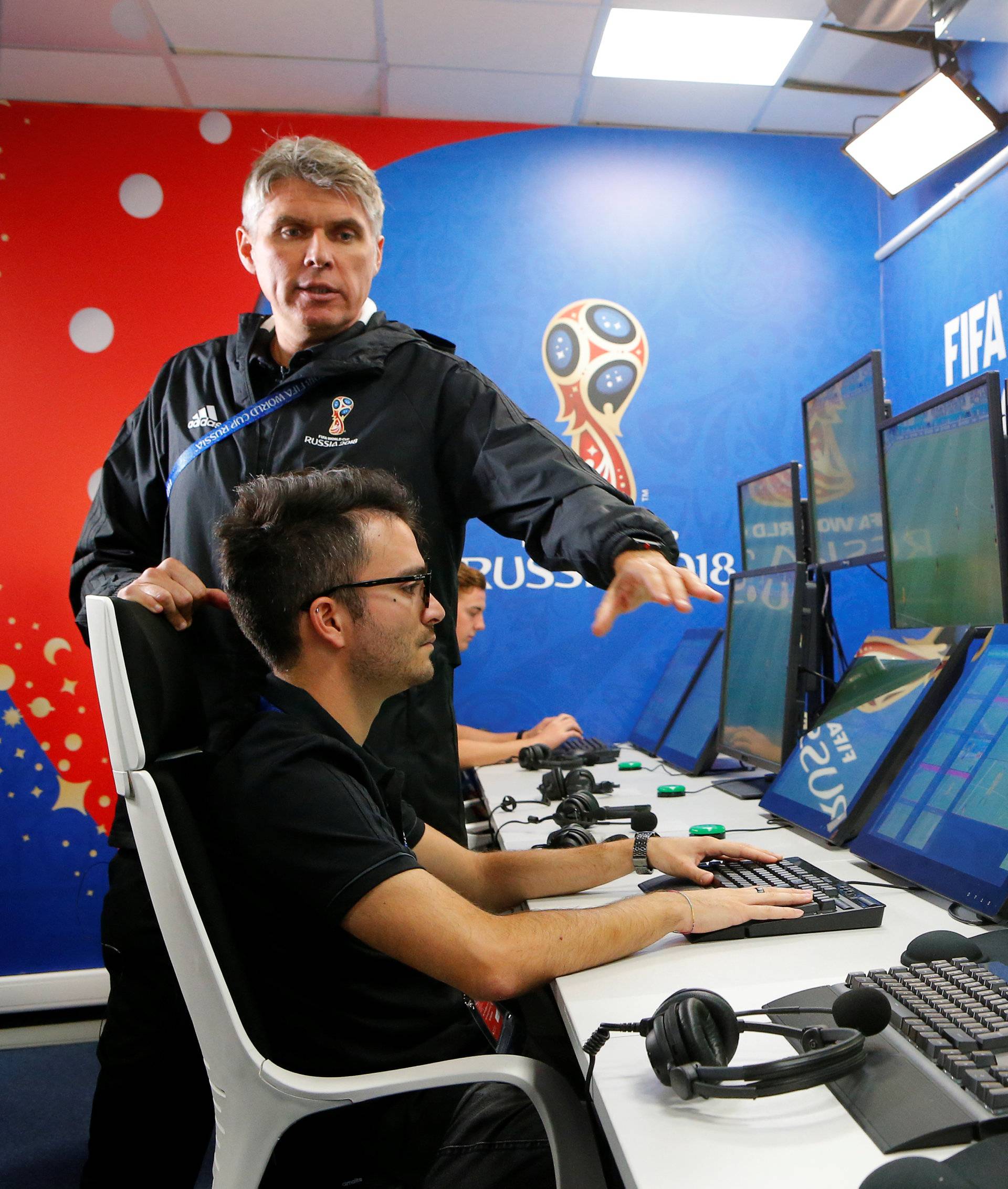 FIFA VAR Refereeing Project Leader Rosetti demonstrates a video operation room in Moscow