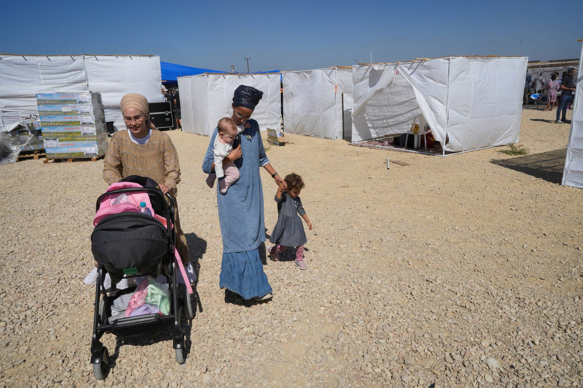 A woman speaks during conference on the resettlement of the Gaza Strip, in Be'eri