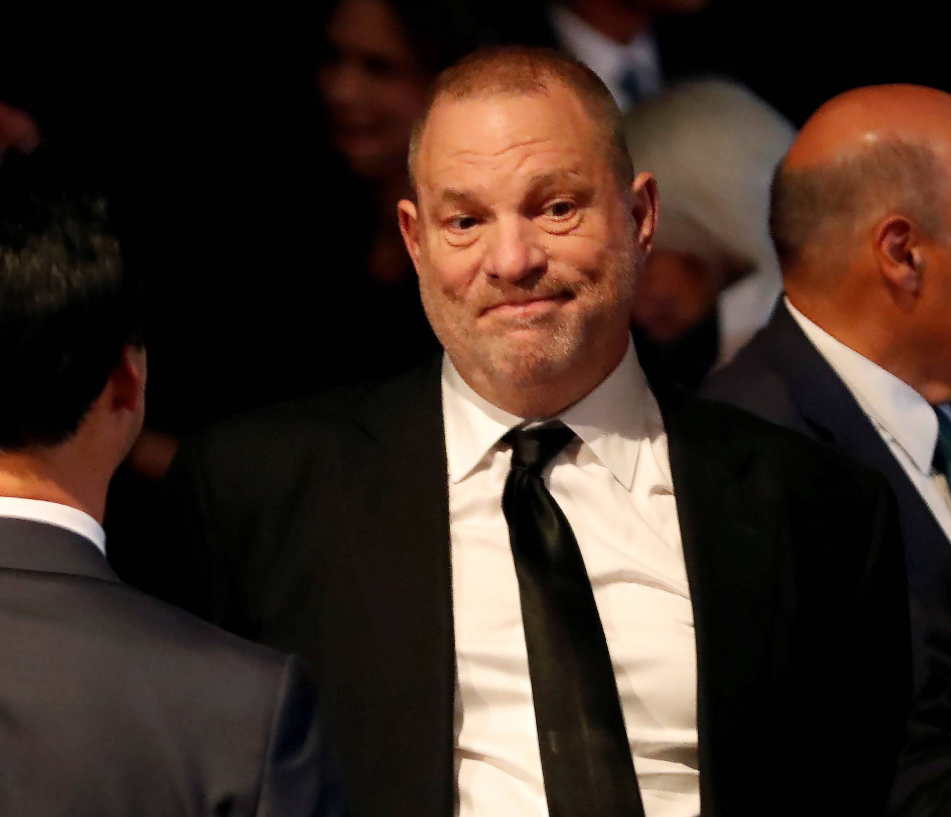 FILE PHOTO: Producer Weinstein stands in the audience ahead of the first presidential debate between U.S. presidential nominee Donald trump and U.S. presidential nominee Clinton in Hempstead