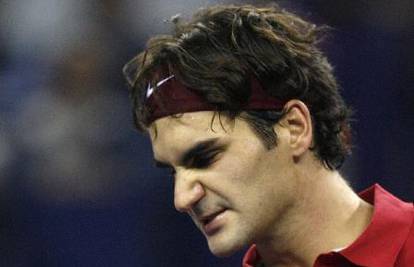 Federer prvi put pobijedio Nalbandiana na zemlji