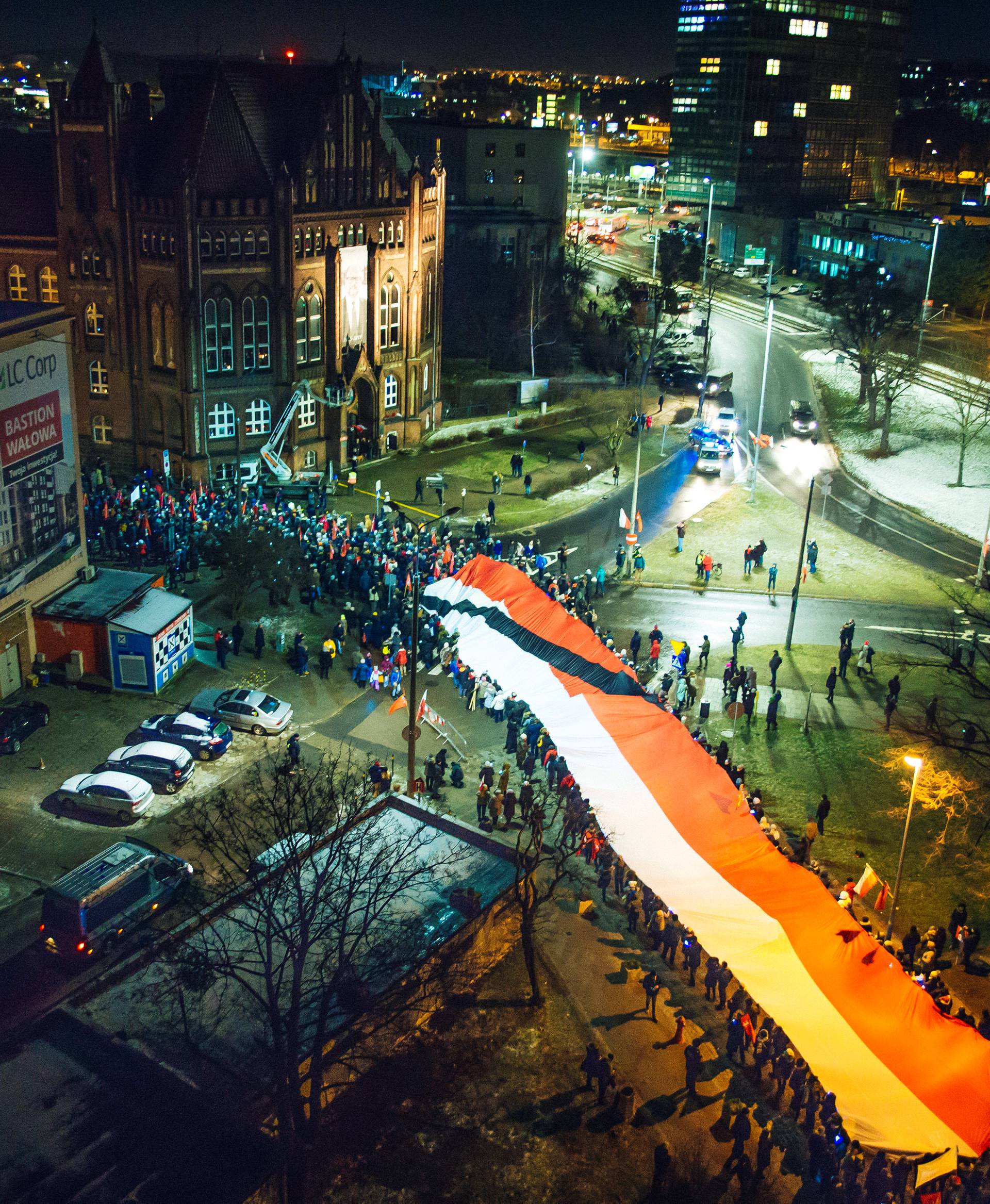 People take part in procession following the coffin of Pawel Adamowicz, Gdansk mayor who died after being stabbed at a charity event, in Gdansk