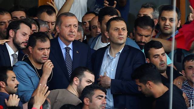 Turkish President Erdogan is seen amid his supporters at the Ataturk Airport in Istanbul