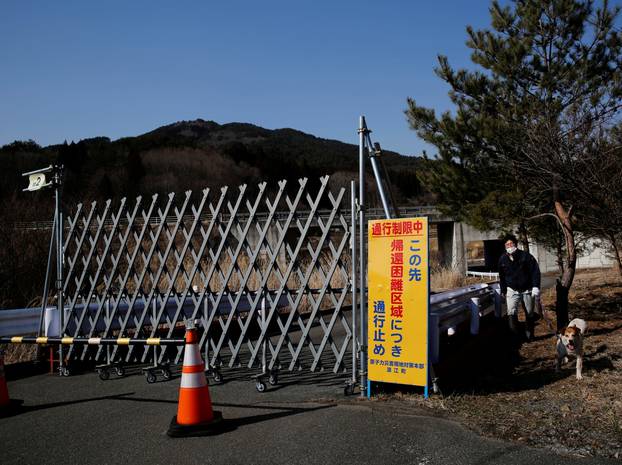 The Wider Image: The man who saves forgotten cats in Fukushima