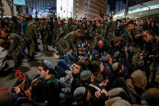 Israelis protest a ceasefire deal, in Jerusalem