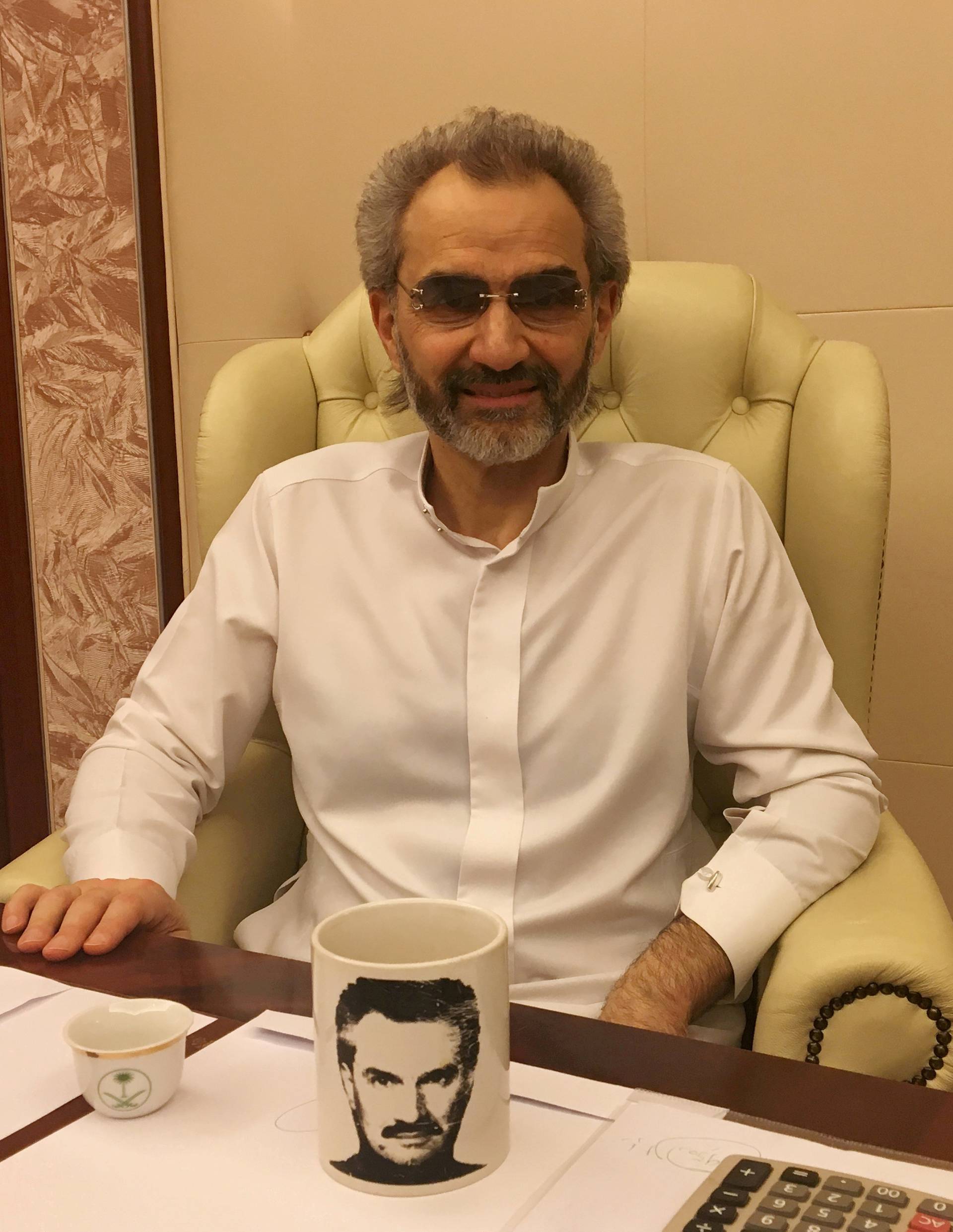 FILE PHOTO: Saudi Arabian billionaire Prince Alwaleed bin Talal sits for an interview with Reuters in the office of the suite where he has been detained at the Ritz-Carlton in Riyadh