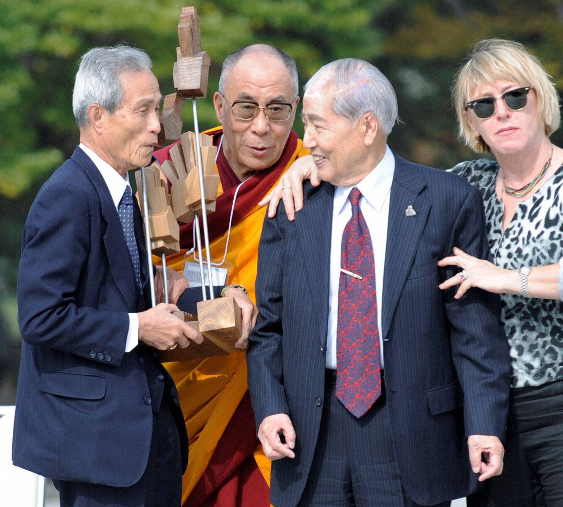 FILE PHOTO: Nobel Peace Prize laureates acknowledge atomic bomb survivors during an award presentation in Hiroshima