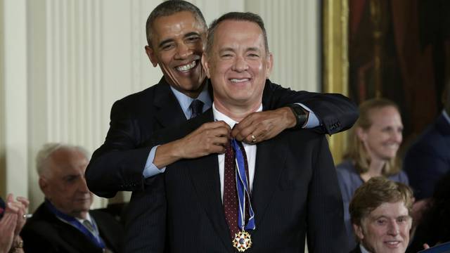 U.S. President Obama presents the Presidential Medal of Freedom to actor Hanks during ceremony at the White House in Washington